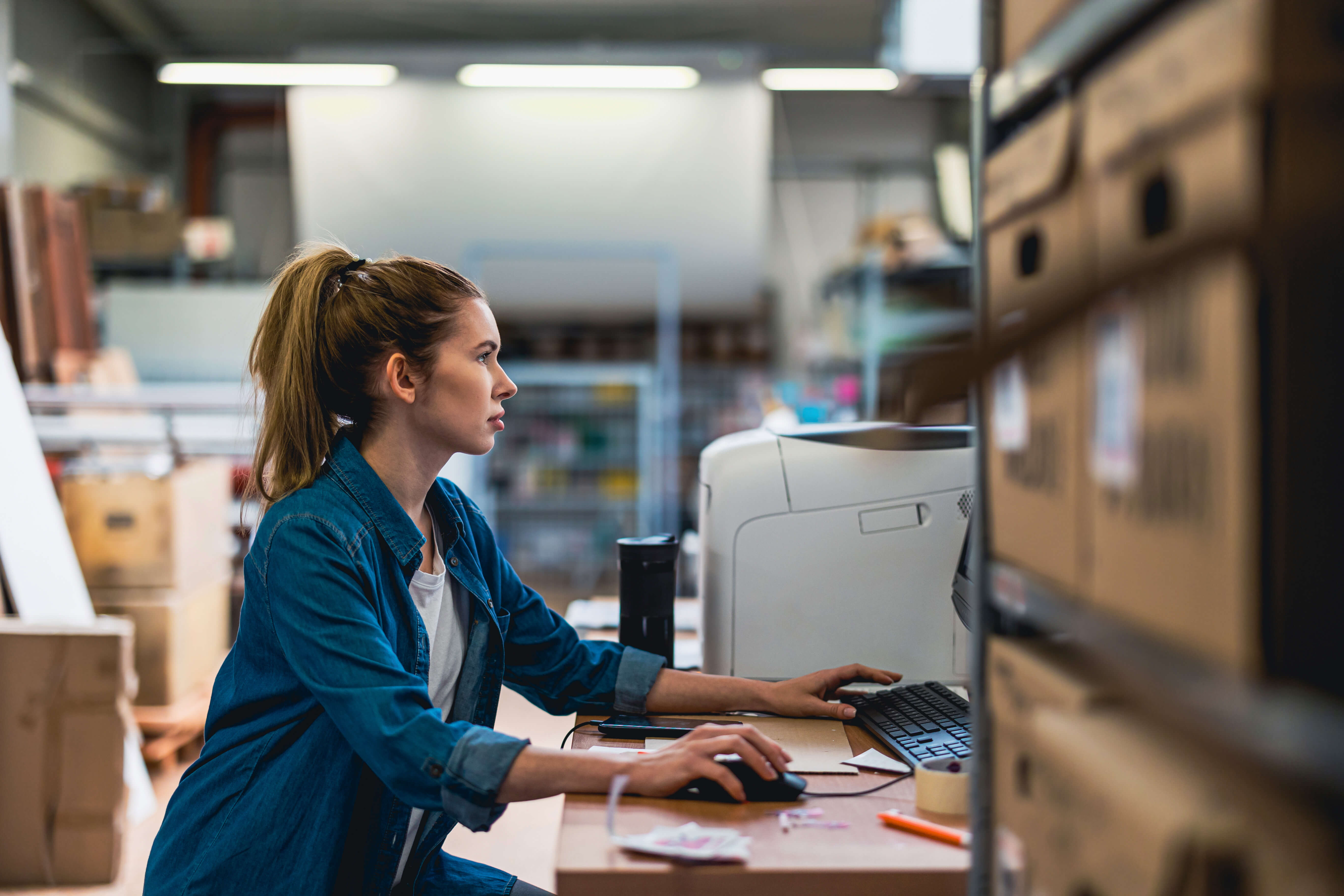 How do mid-sized companies share company-wide updates with employees?